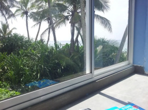 Malika's Yellow House