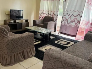 Karibu Nyumbani (2 bdroom apt with a swimming pool