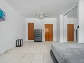 Beach Access Escape With Pool and Tanning Lounges