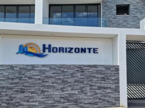 Apartamento encantador com piscina e vista mar