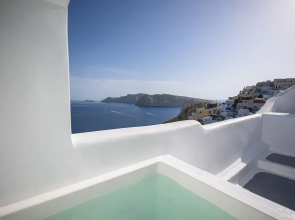 Three Domes Oia - an Iconic Collection