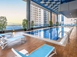 Отель Ramada by Wyndham Dubai Barsha Heights