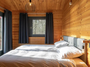 Restyled Wooden Lodge Near the Maasduinen