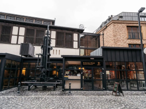 Modern and Industrial Apartment in Historic Brewery by the Old Town