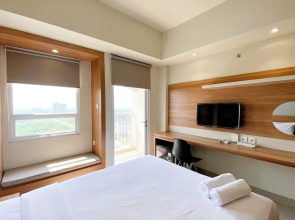 Minimalist And Homey Studio Apartment At Mustika Golf Residence