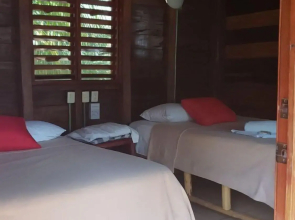 Cabanas k'iin Yéetel Há Bacalar