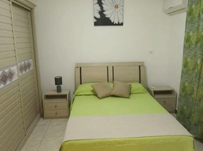 Apartment With 2 Bedrooms in Flic en Flac, With Wonderful sea View, Shared Pool, Furnished Garden