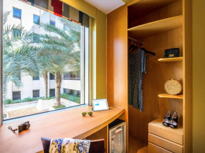 Отель Ibis Mall Avenue Dubai