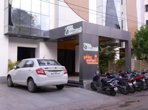 OYO 1030 Hotel Palm View Residency