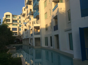 The Che Pool Access Beachfront Condo by Away