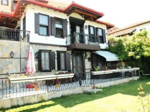 Escape to History in a Stunning Stone House with Garden and Sea View in the Heart of Alanya