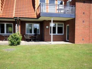 Ferienwohnung-9-mit-Terrasse-Garten-Landhaus-Hubertus-Duhnen