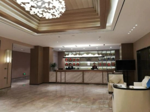 Xinzheng Xingangwanhua Hotel