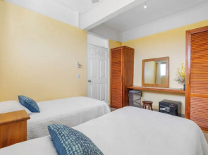 Modern Top-Floor Condo with Panoramic Views and Community Pool