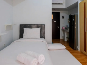 Homey Studio Room At Casa De Parco Apartment By Travelio