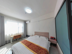 Xinjinlong Holiday Hotel (Linzhou Avenue Bus Station)