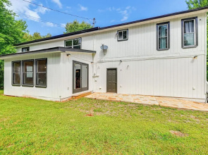 Porch, Yard & Creek Access: Spacious Sylva Home!