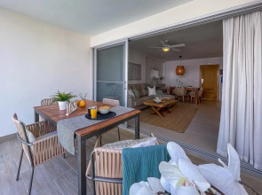 Affordable Luxury Condo Steps Away From the Beach
