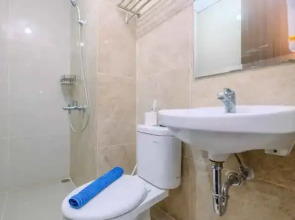 Homey and Modern Look 2BR Transpark Cibubur Apartment near Mall By Travelio