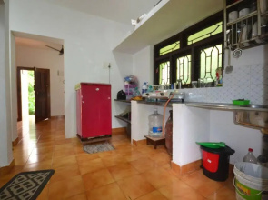 Riverside two-bedroom cottage with patio