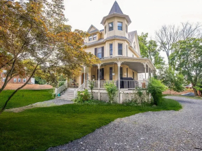 Charming Victorian Home With Porch & Large Yard 7 Bedroom Home