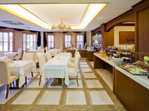 Отель GLK Premier The Home Suites & Spa