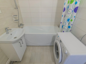 Апартаменты Двухкомнатная Квартира на Мансардном Этаже