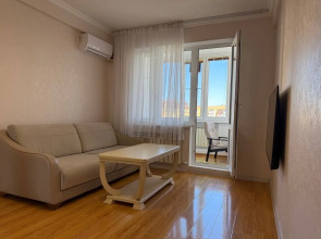 Апартаменты Светлые с балконом и стильной гостиной на Магомедали Магомеджанова