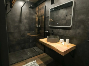 Шале двухэтажный А-фрейм с панорамным остеклением и террасой