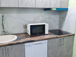 Квартира-студия новая в самом центре города с дизайнерским ремонтом