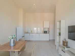 Апартаменты Двухкомнатная Квартира на Мансардном Этаже