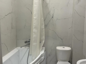 Апартаменты с Двумя Спальнями в Центре