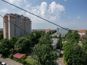 Апартаменты с видом на закат и крыши