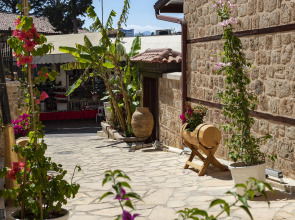 Отель WOO Town Suites