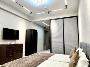 V Neboskryobe Tashkenta U-Tower 61 Apartments
