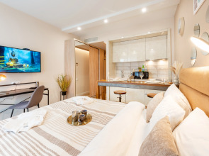 Квартира Vintage Haven Studio - Bohemian Style in Alliance Palace