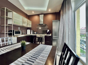 Апартаменты Уютная двухкомнатная квартира рядом с ЦУМом