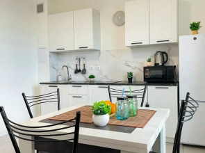 Апартаменты Sunny Days Apartment Оранж Парк 13