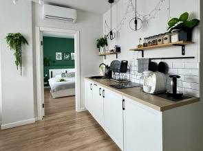 Апартаменты Зелёная квартира с потрясающим видом