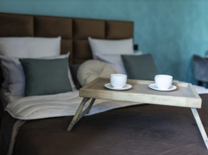 V Tsentre Goroda Apartments