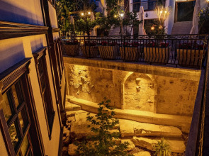 Отель WOO Town Suites