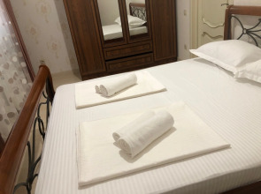 Апартаменты у моря с видом на город и горы