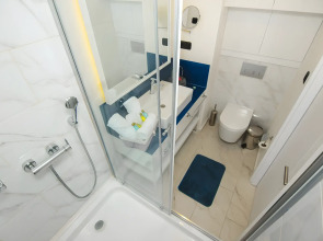 Отель Orbi City GE