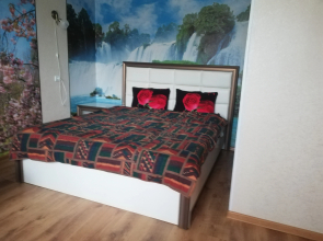 V Tsentre Goroda Apartments