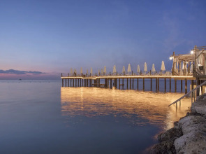 Отель Merit Crystal Cove Casino & SPA