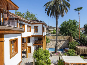 Отель WOO Town Suites