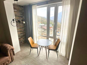 Апартаменты Двухуровневая Студия в горах