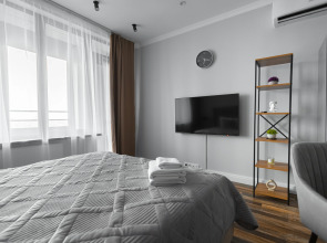 Апартаменты Lalapart Gray stone на 30 этаже небоскреба Савеловский Сити