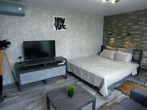 Апартаменты в Высотке