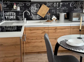 Квартира Уютная студия в 5 минутах от ТРЦ Планета